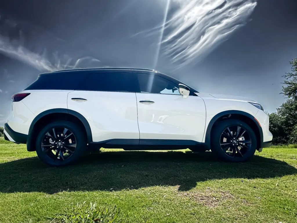 2024 Infiniti QX60 blackout out trim work, Xpel window tint, door handles, roof rack, and tires