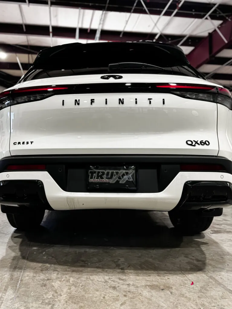 Back of 2024 Infiniti QX60 blackout out emblems