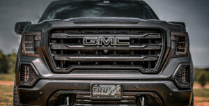 TRUXX Outfitters' innovative chrome delete paint technology ensuring a sleek, blacked-out look on a vehicle without chipping or peeling on this 2024 GMC Denali