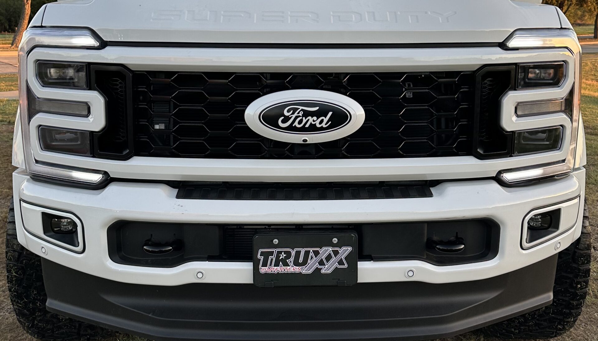 Platinum Perfection on this 2024 Ford F-450 Super Duty brought to you by Truxx